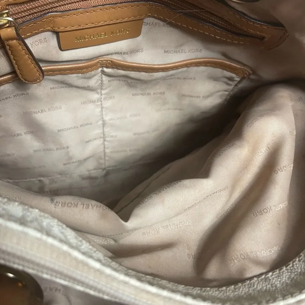 Michael Kors Beige signature Coated Canvas tote , tan leather straps .